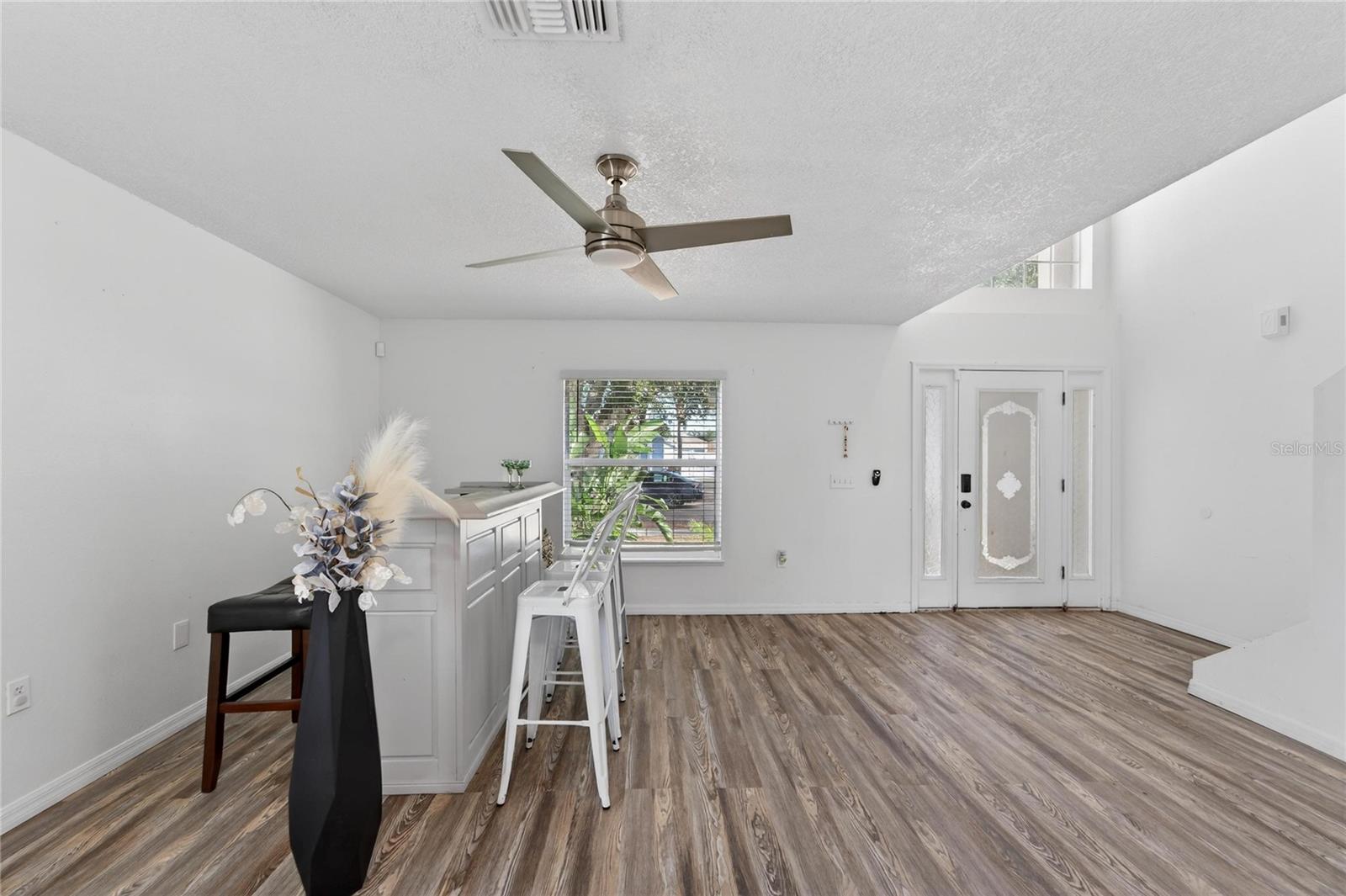 Family Room with unattached bar that conveys