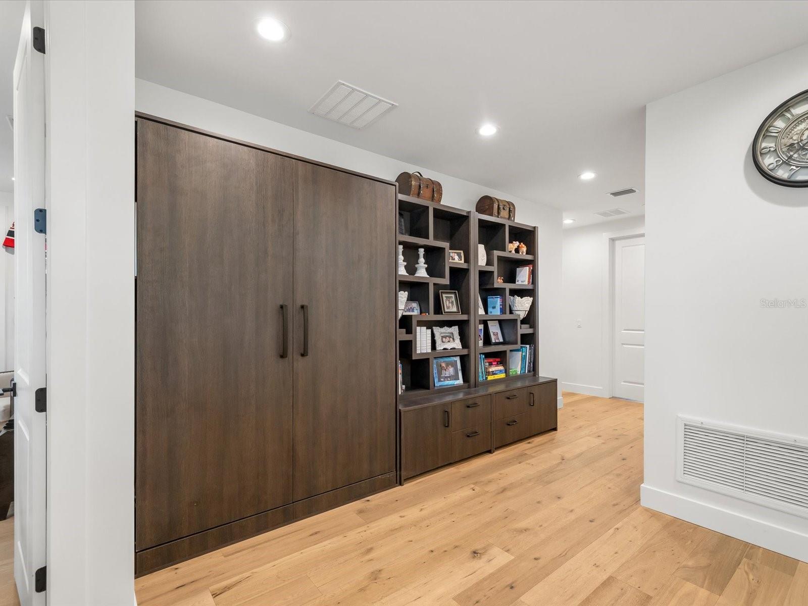 Custom built Murphy bed and storage, upstairs hallway