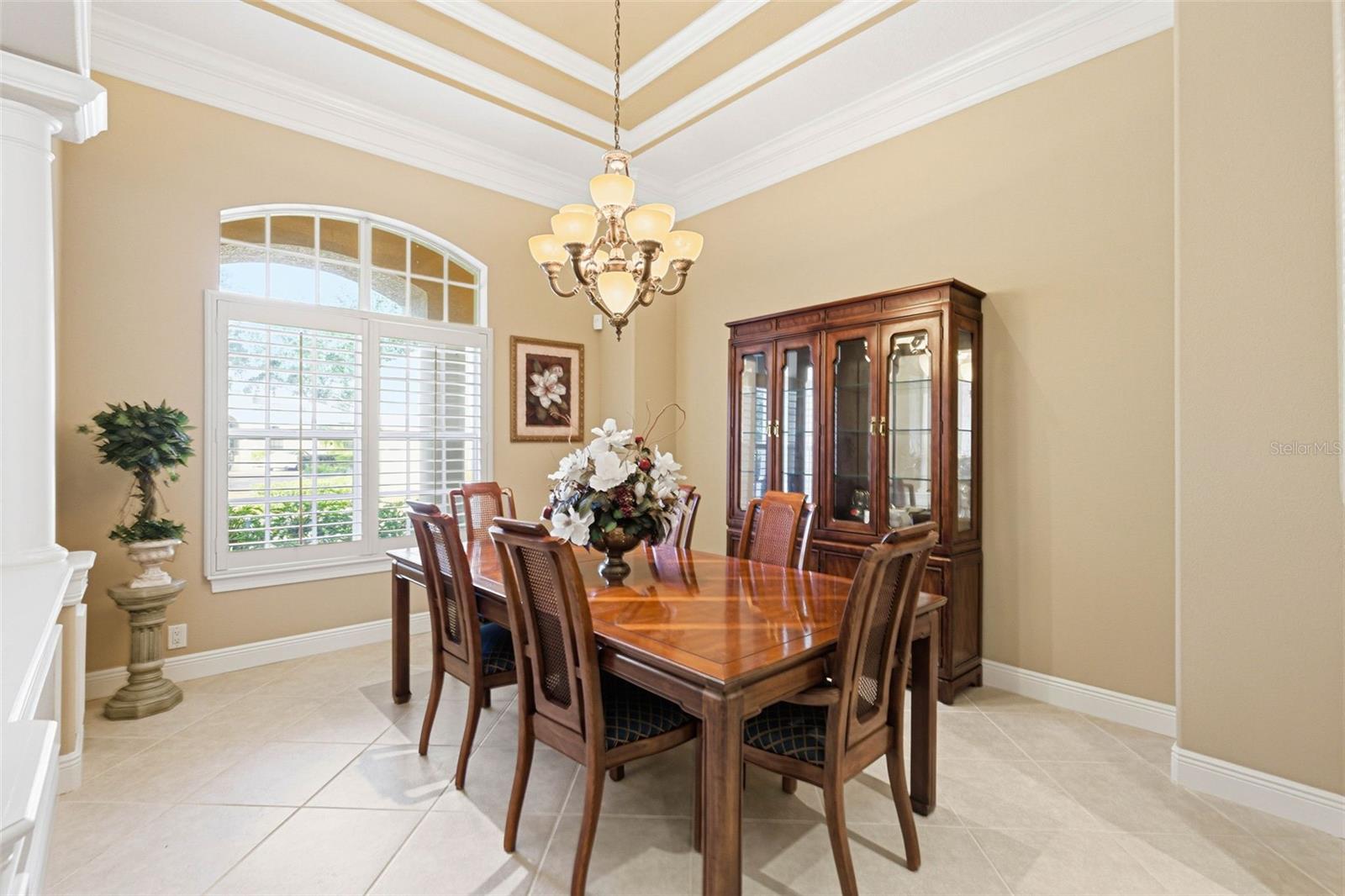 Dining room featuring plantation shutters