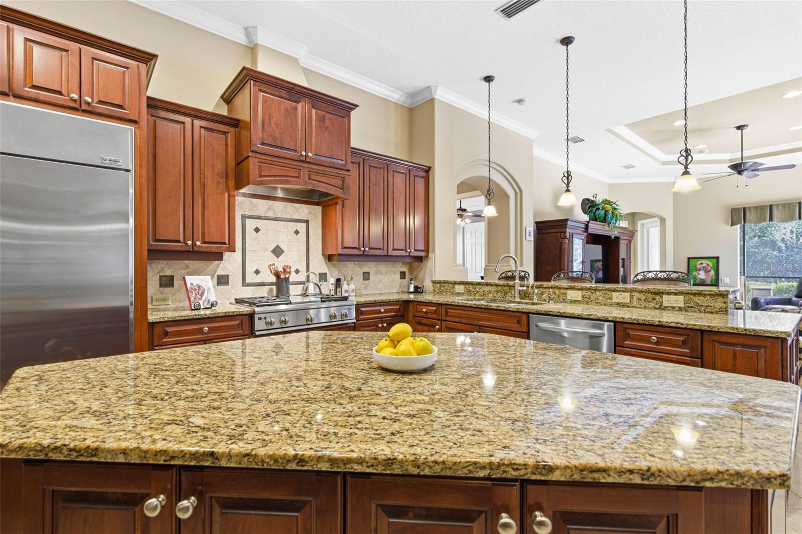 Large kitchen sits between dining room and family room