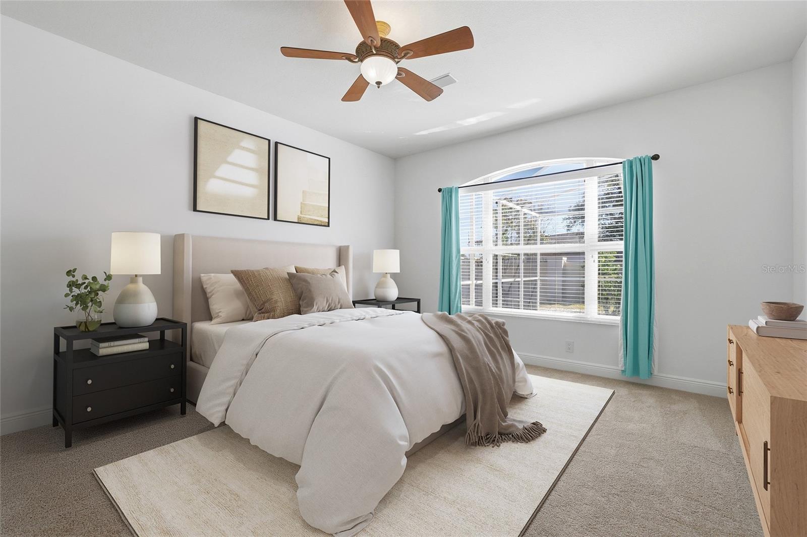 Master Bedroom Downstairs with plenty of room for your King Sized bed and a couch+dresser