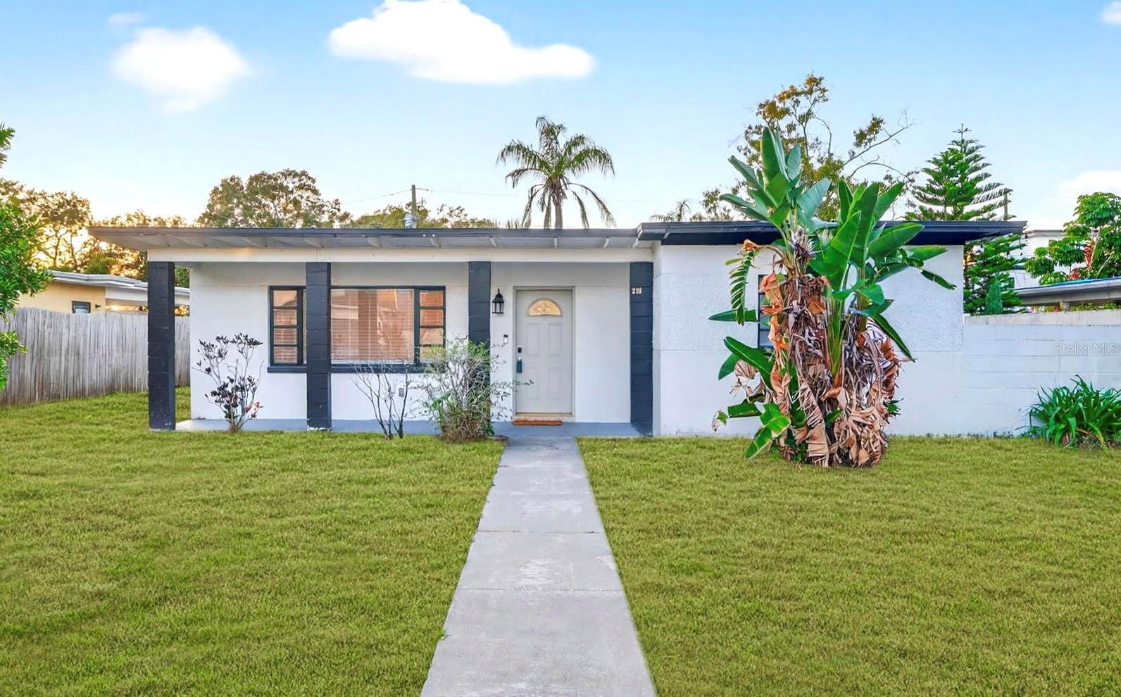 Front yard off N Glen Ave. Lawn shown has been digitally enhanced to illustrate potential landscaping
