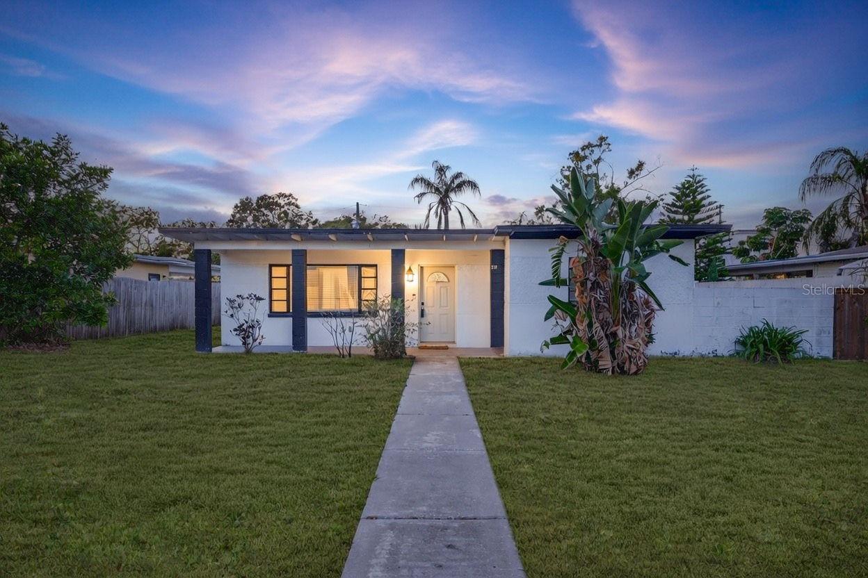 Lawn shown has been digitally enhanced to illustrate potential landscaping