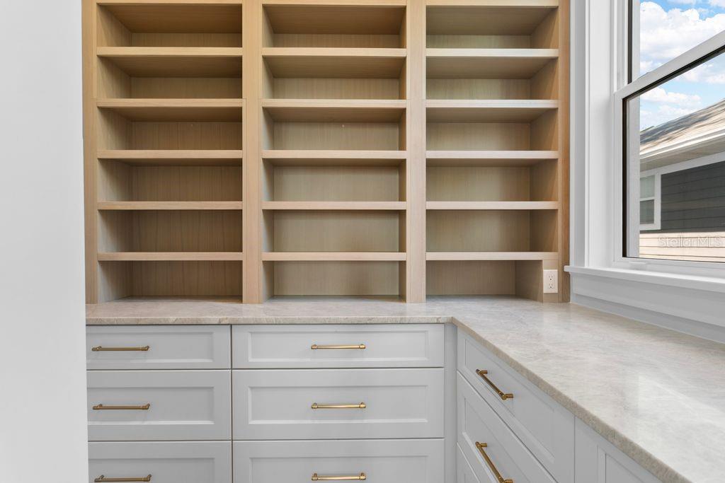 ROOM-SIZED WALK-IN PANTRY