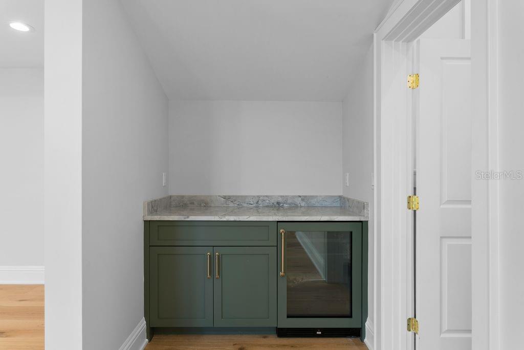 COMPLETE WITH STONE BREAKFAST BAR AND MINI FRIDGE