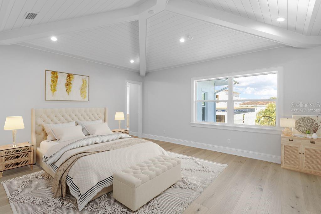 LARGE, SECLUDED MASTER WITH  VAULTED  STRAPWORK CEILING.  Room has been virtually staged