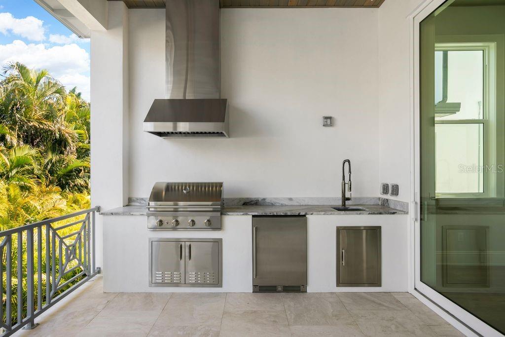 HOODED GAS GRILL, MINI FRIDGE, SINK AND STORAGE