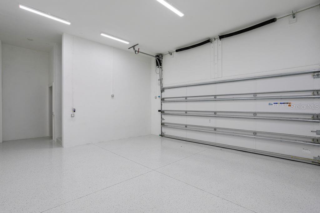 GREAT VOLUME IN GARAGE WITH ROOM FOR LARGE STORAGE LOFT