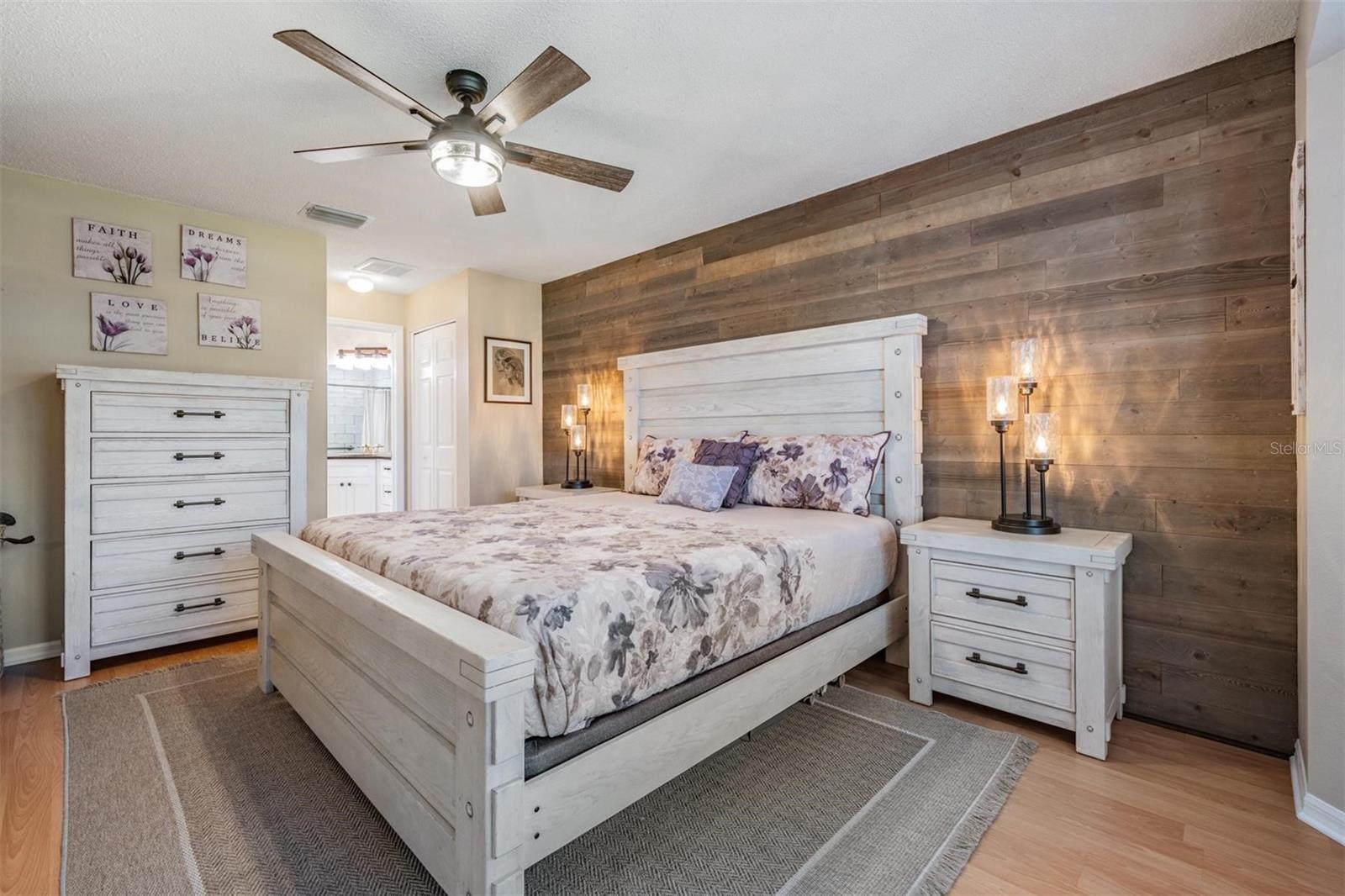 Primary bedroom with designer wall element