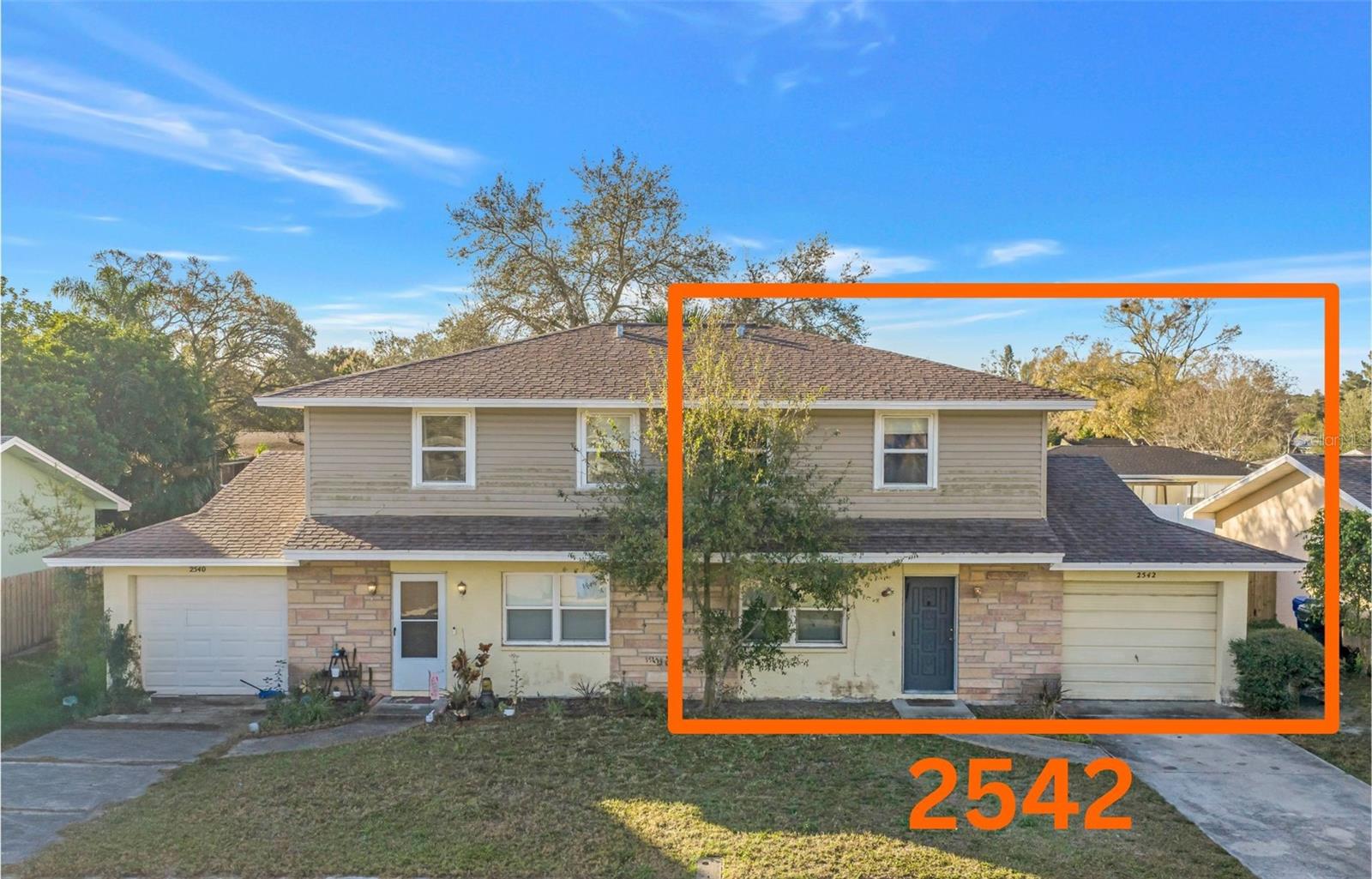 2542 Wilson Ave - an attached single family home