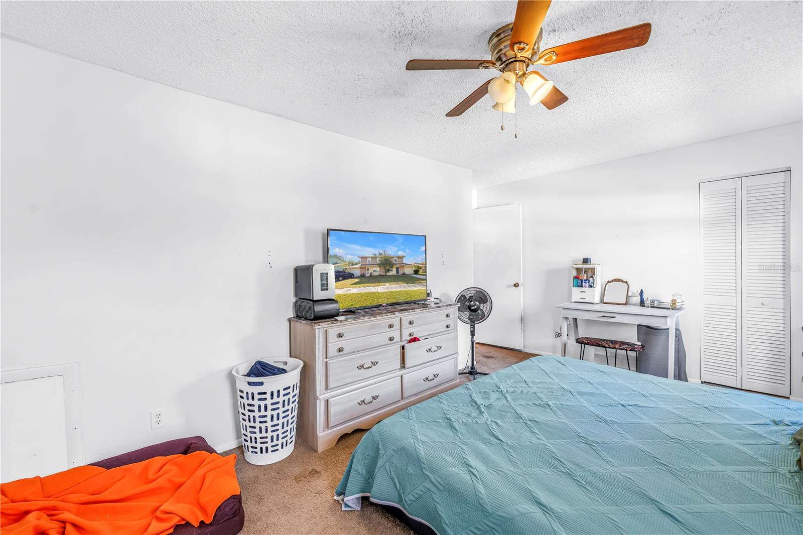 Small walk-in closet in main bedroom