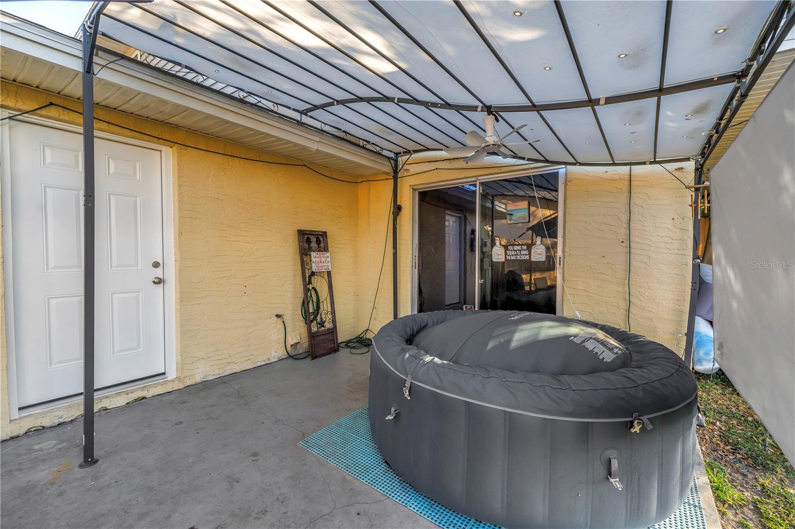 Rear patio - sliding doors to family room - pedestrian door to garage (brand new)