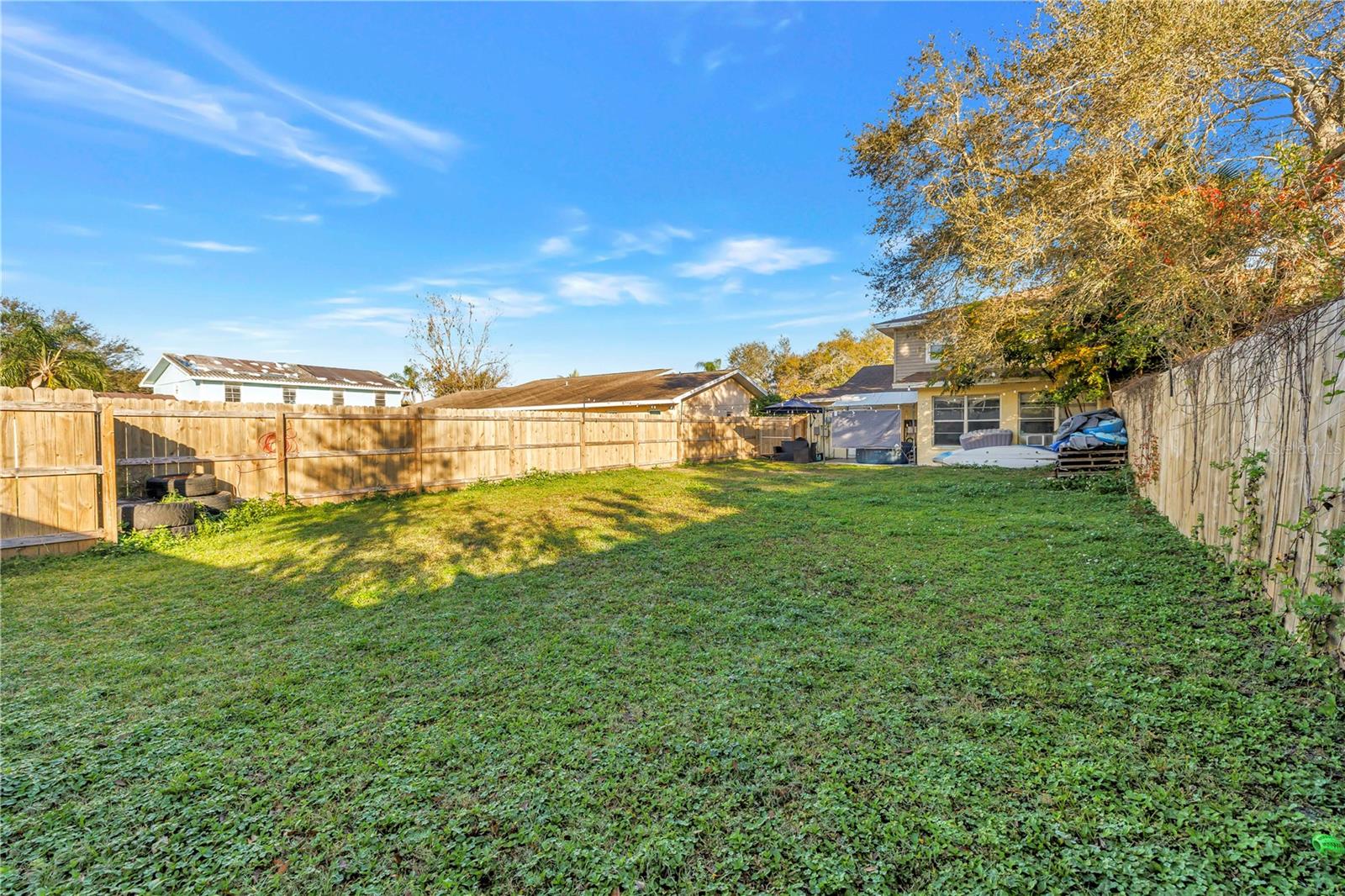 Rear view of yard & back of home