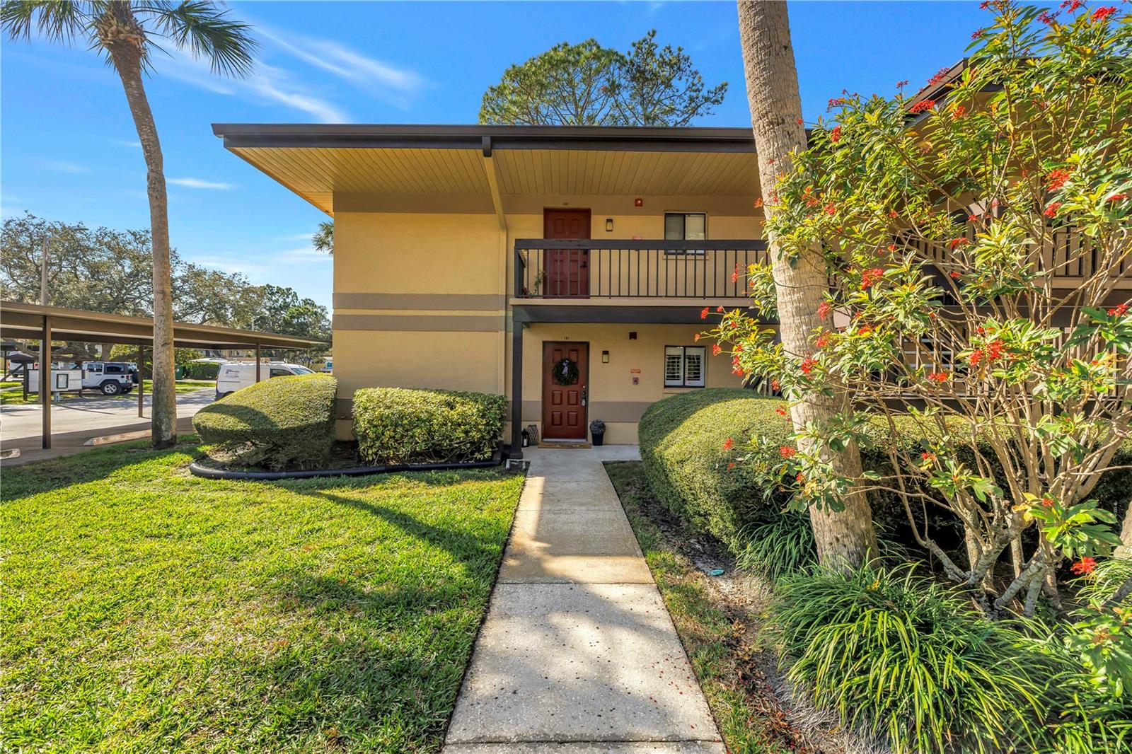 Walking to Unit with Carport 101 immediately outside your front door