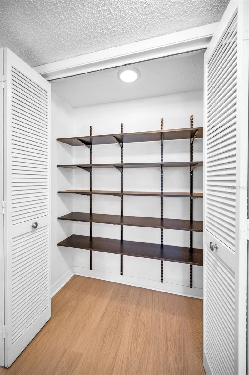 Hall closet near second bedroom
