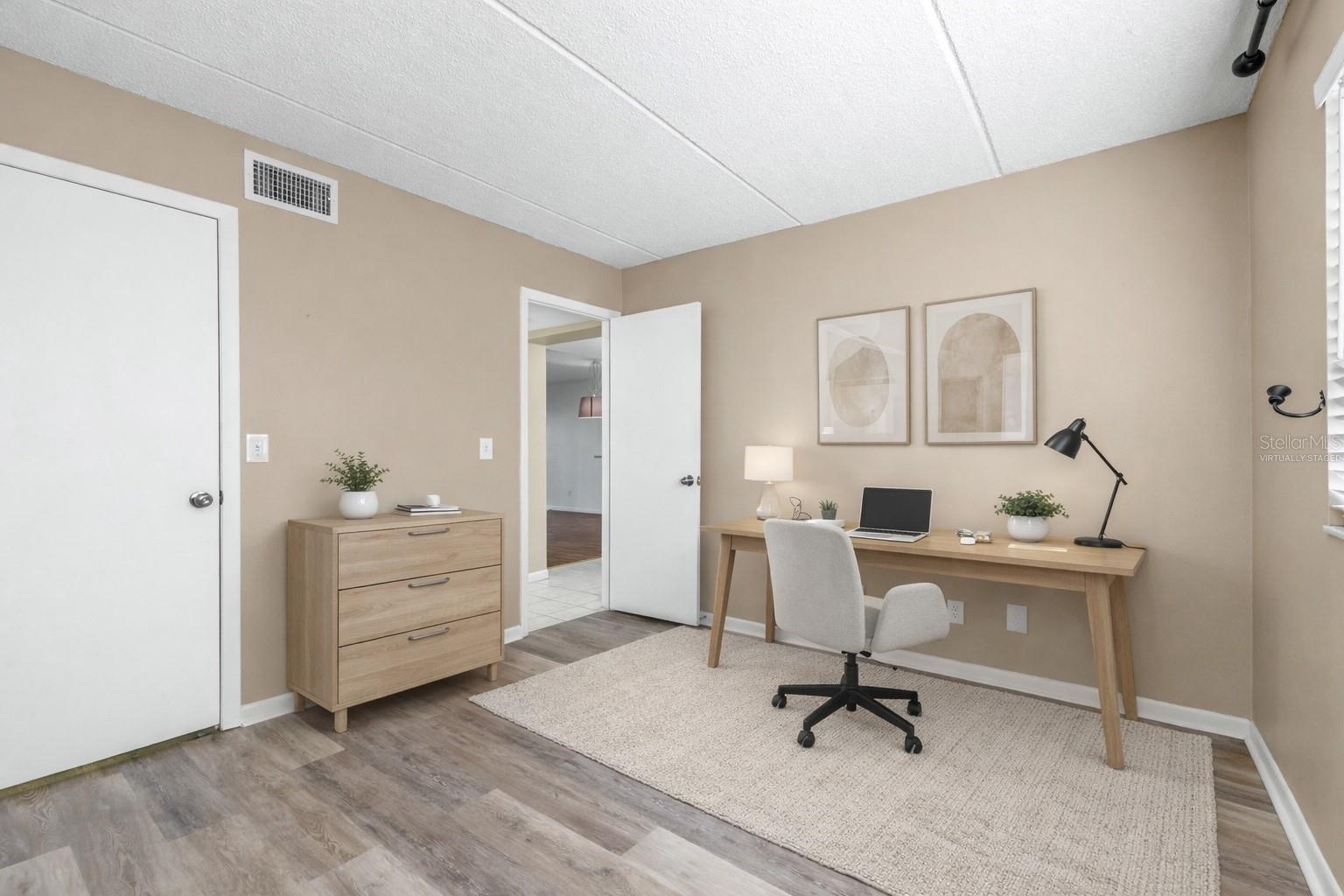 virtually staged office can also be a 2nd bedroom