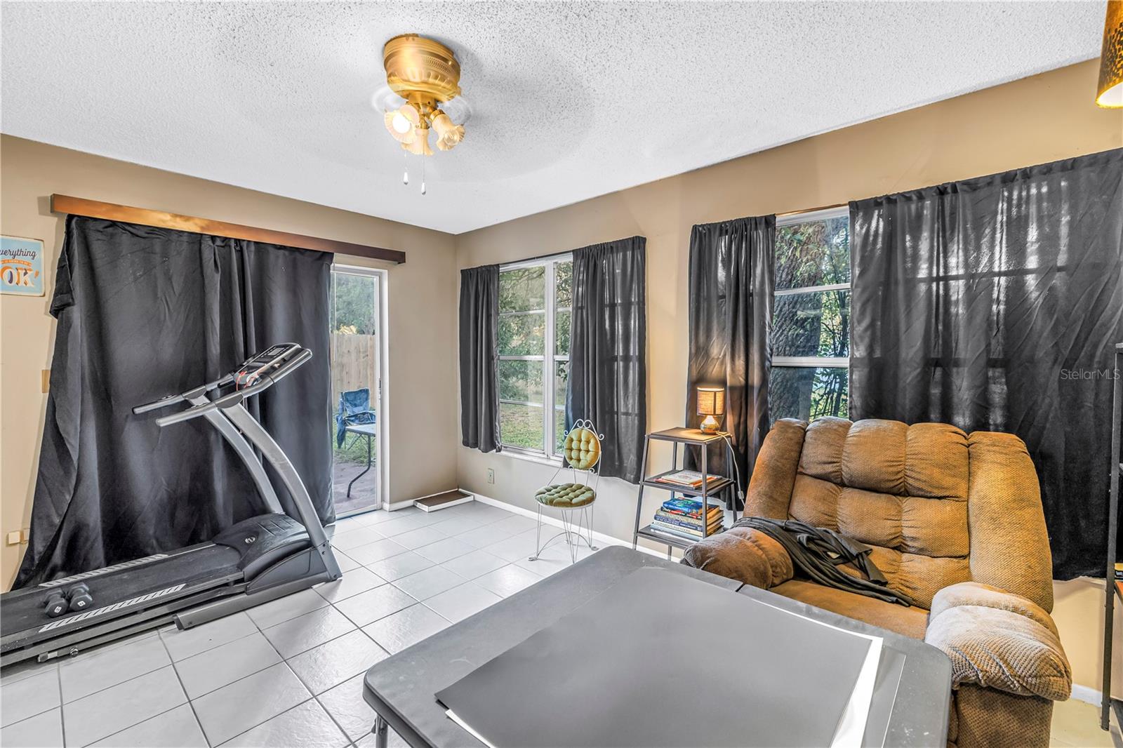 Family room has sliding doors to backyard