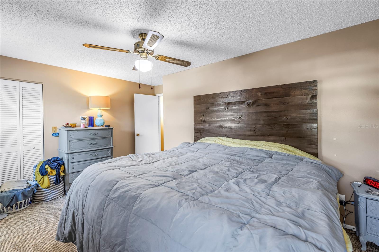 Main bedroom with small walk-in closet