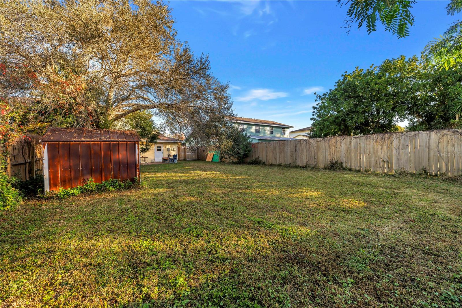 Rear view of yard & home