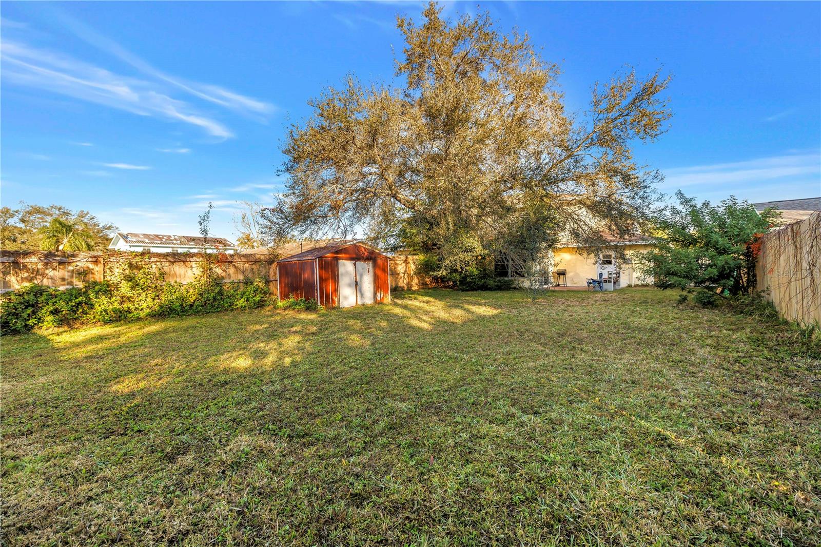 Rear view of yard & home