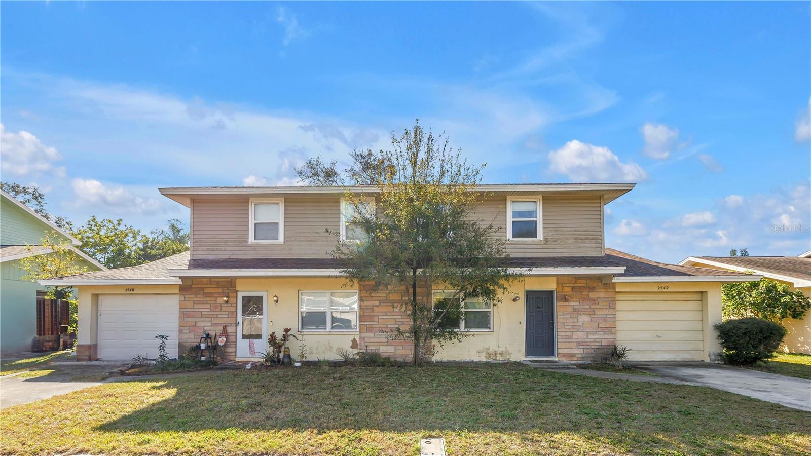 Front of attached homes - each sold separately or together as a package