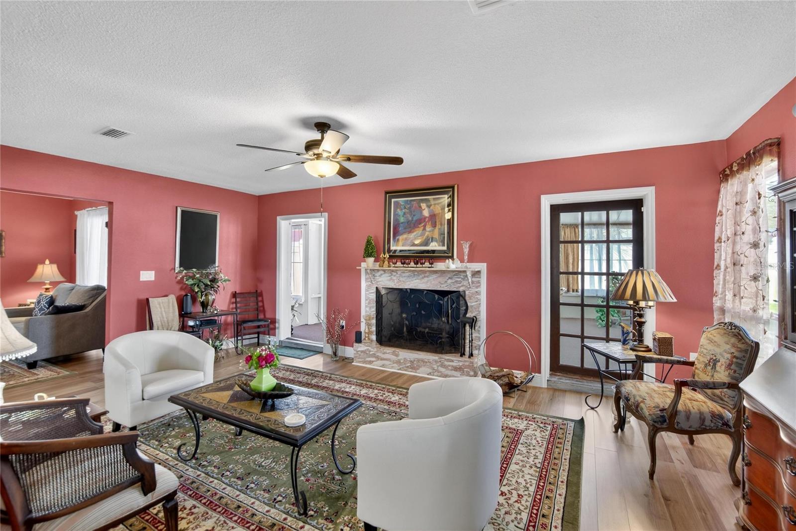 Family Room w/ wood burning fireplace