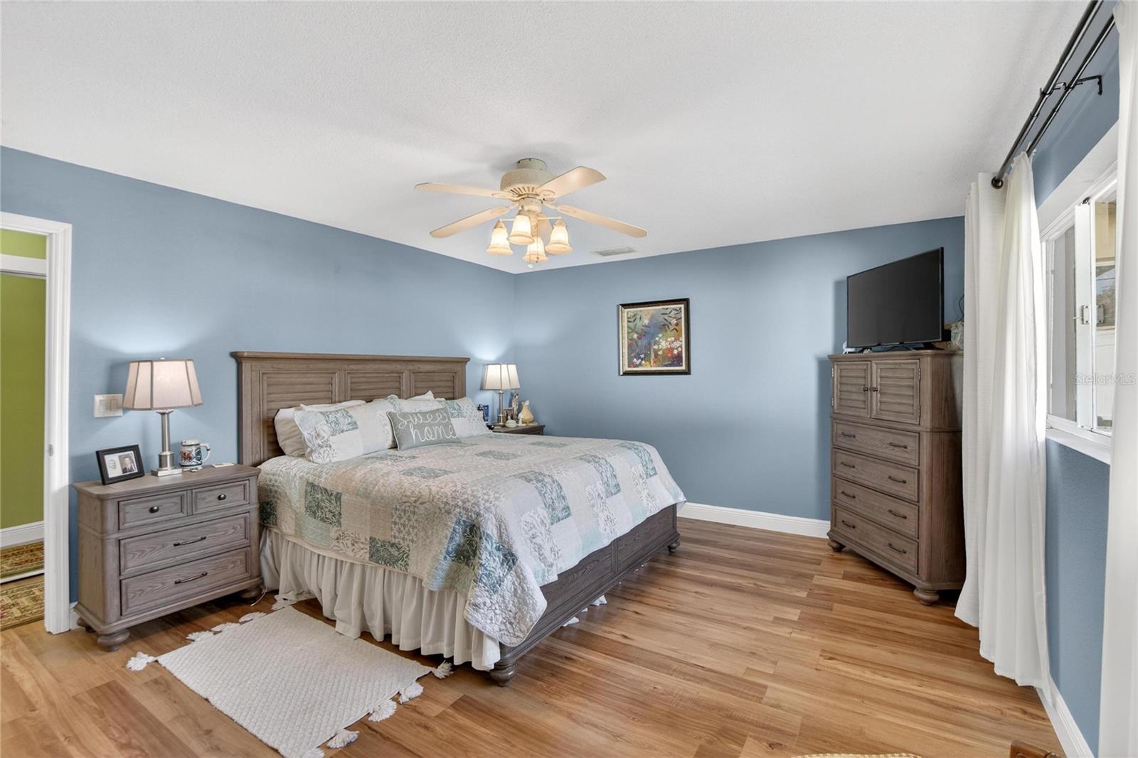 Primary bedroom with king-sized bed