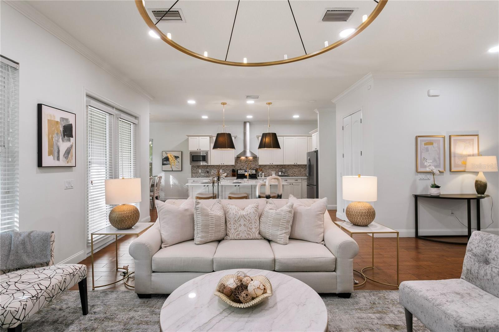 This open-concept kitchen and living room create a seamless space where everyone feels connected.