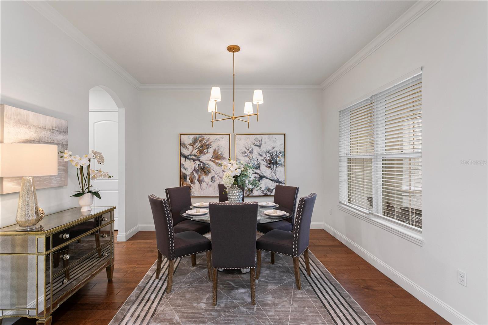 The formal dining room offers a welcoming setting for memorable meals with family and friends.