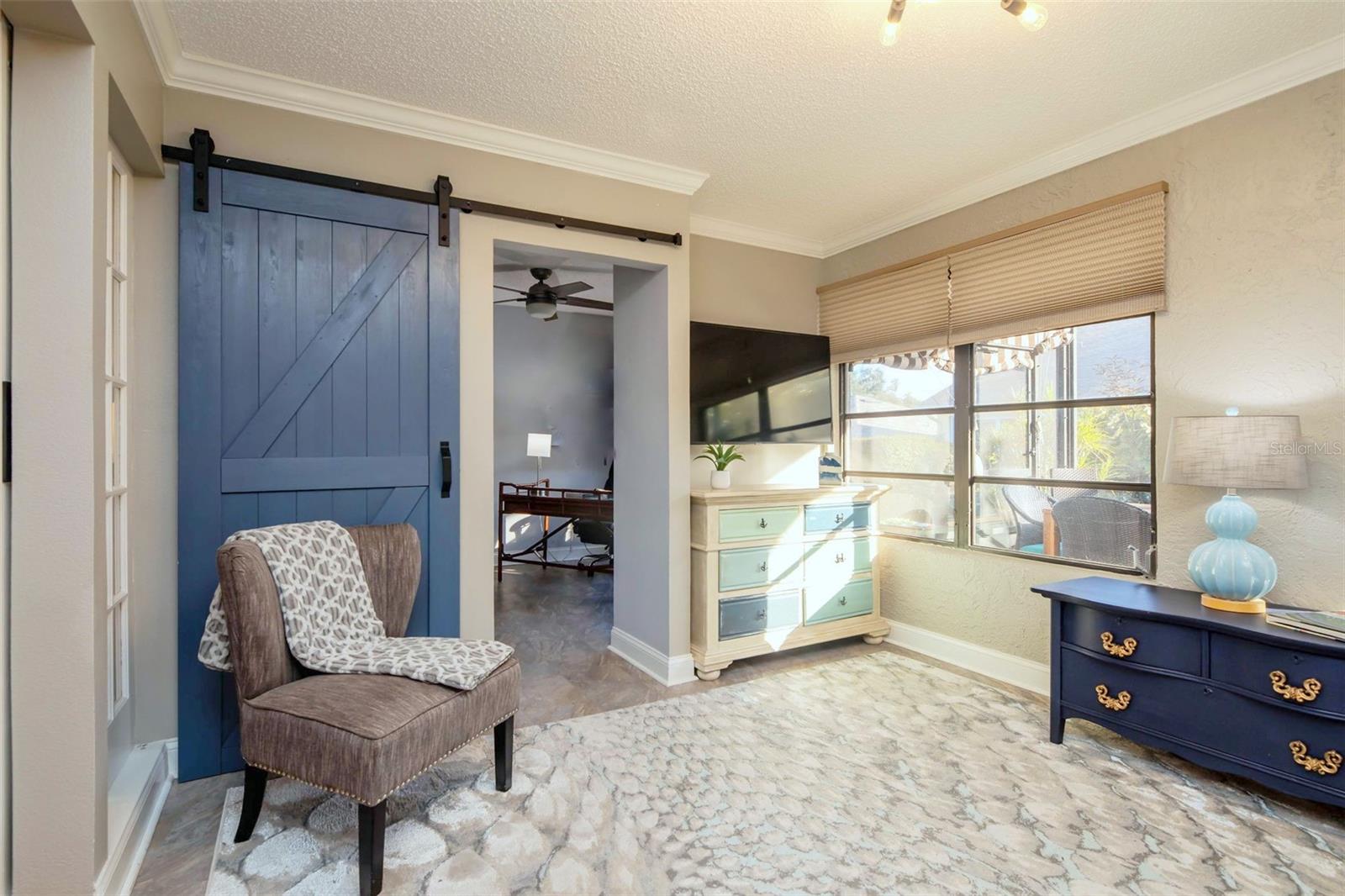 Lots of natural light from the window wall with cellular shades~