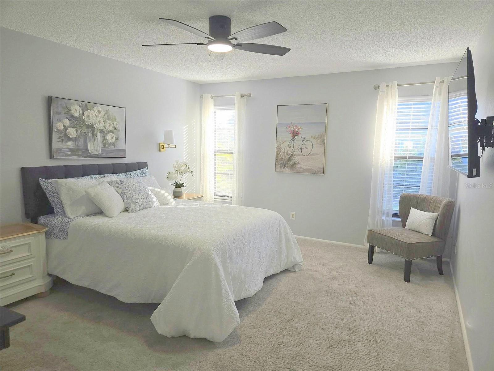 Primary suite is well separated on the back of the house. These windows look out to the private backyard~