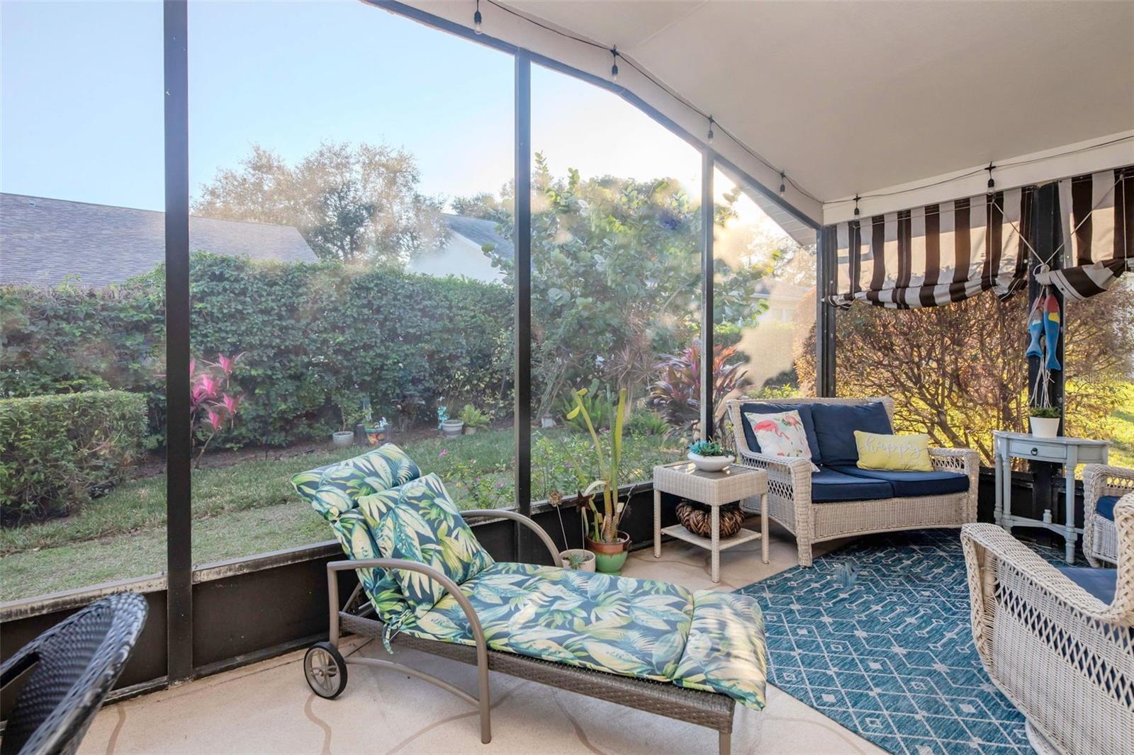 Mature landscaping offers a lush green view along with backyard privacy~