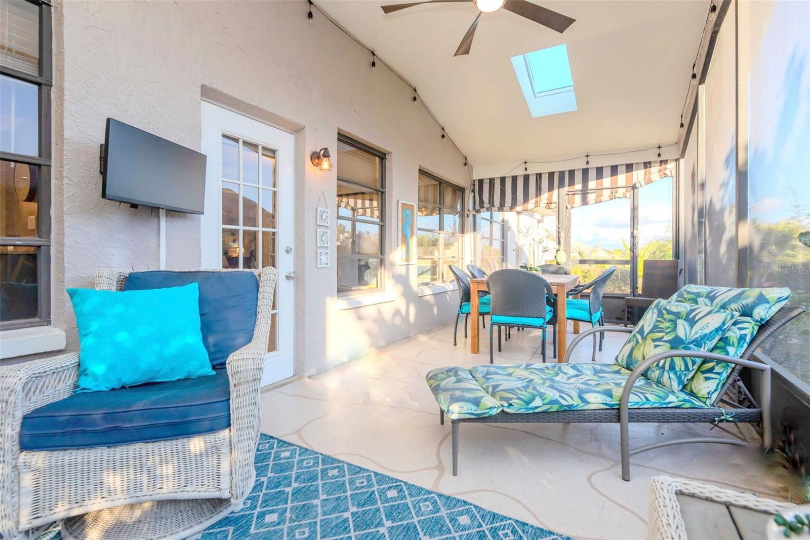 Generous seating area and a TV that stays with the house~