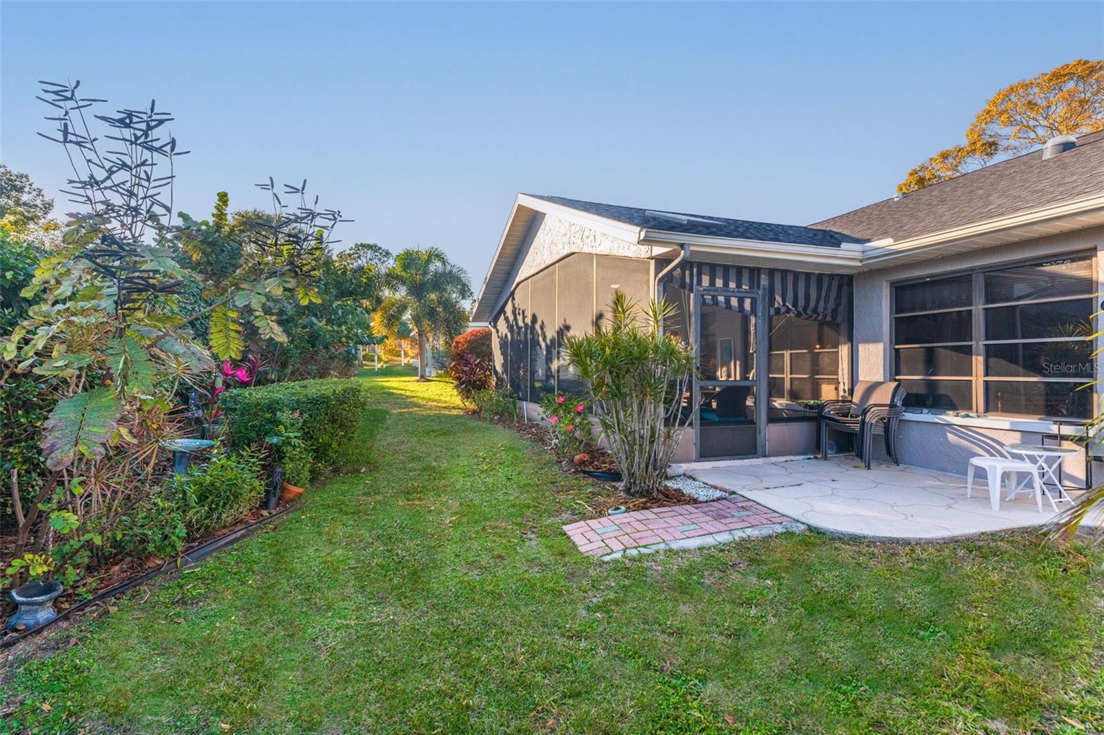 A grill patio conveniently right outside lanai door~