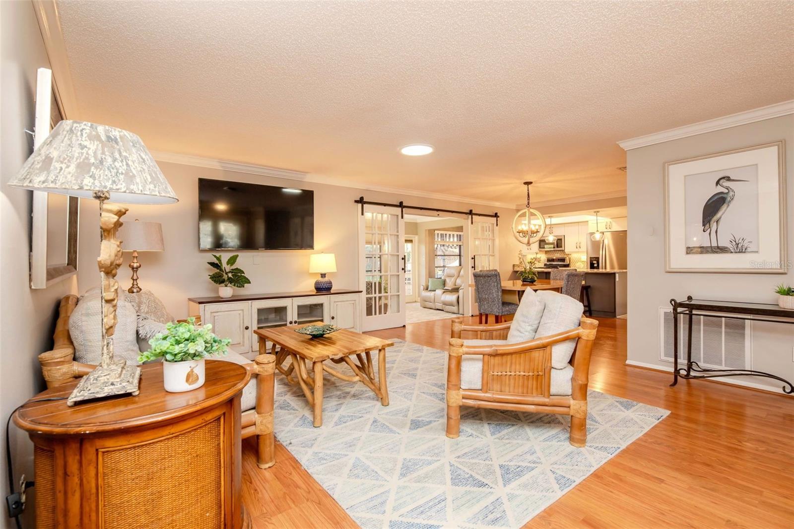 Light wood-look flooring through living & dining room areas~