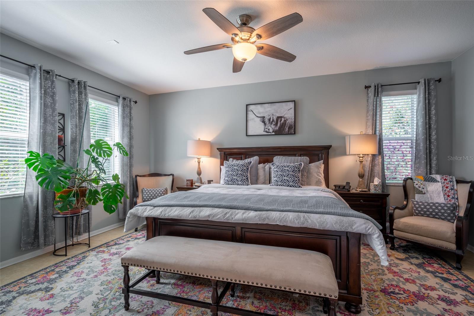 Plenty of light in Primary Bedroom with conservation view.