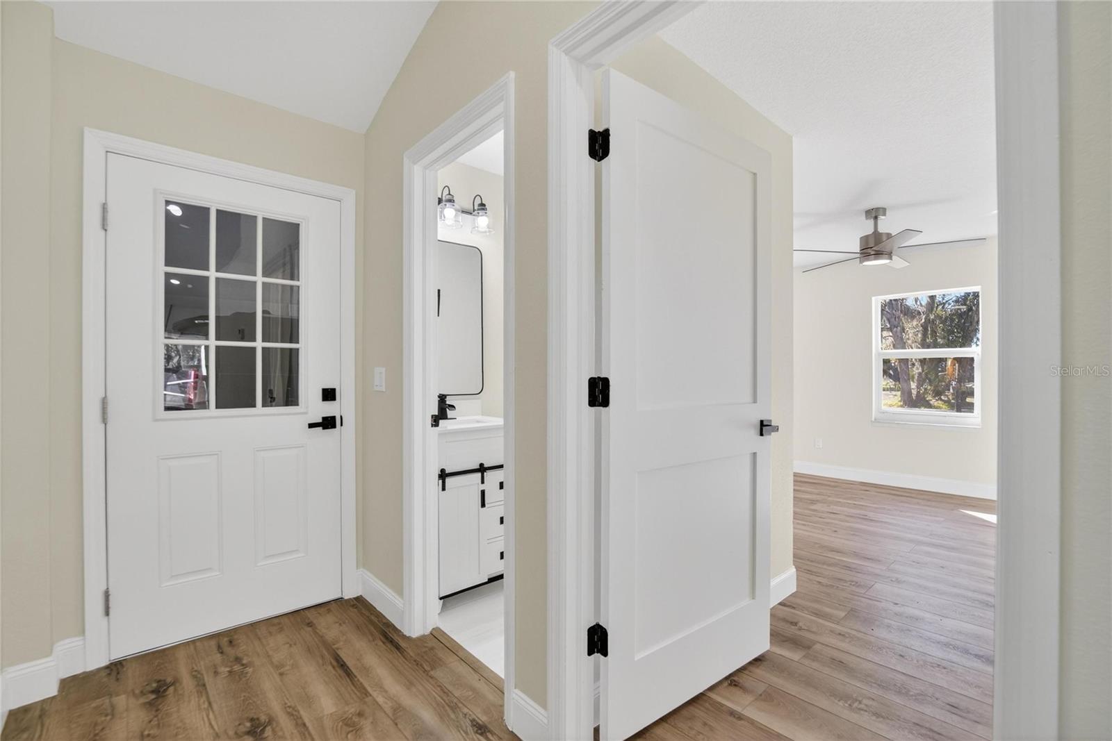 Entrance/Exist Garage/ half bathroom,