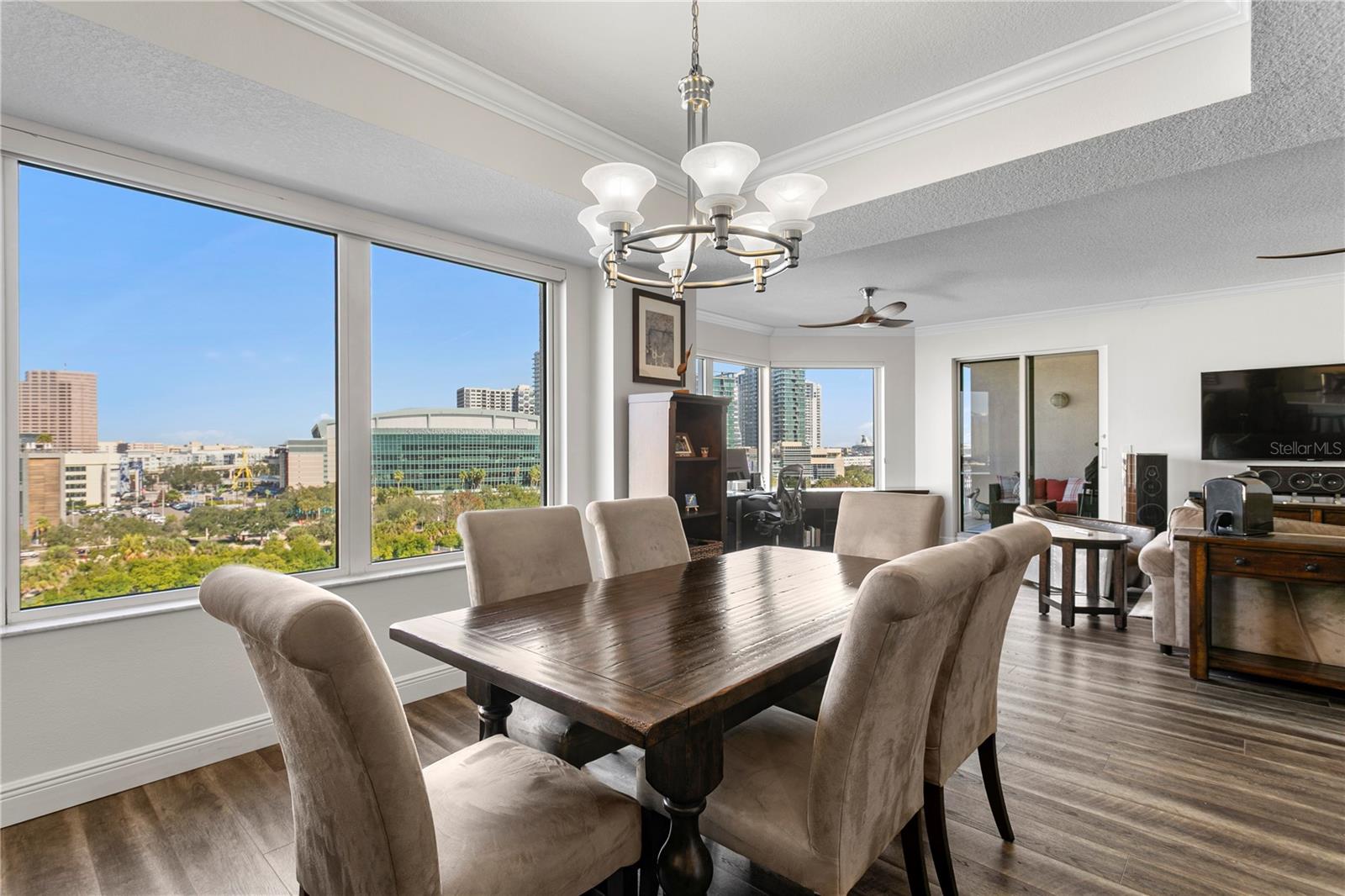 Dining area ideally situated between the kitchen and living room, featuring its own views.