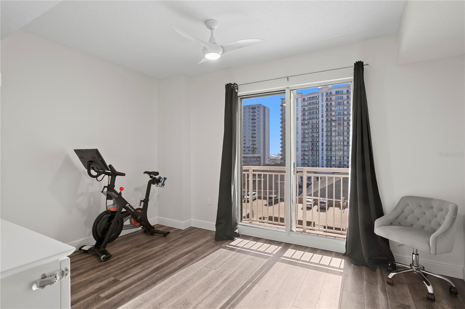 Second bedroom currently configured as a gym and guest space, adaptable to your needs.