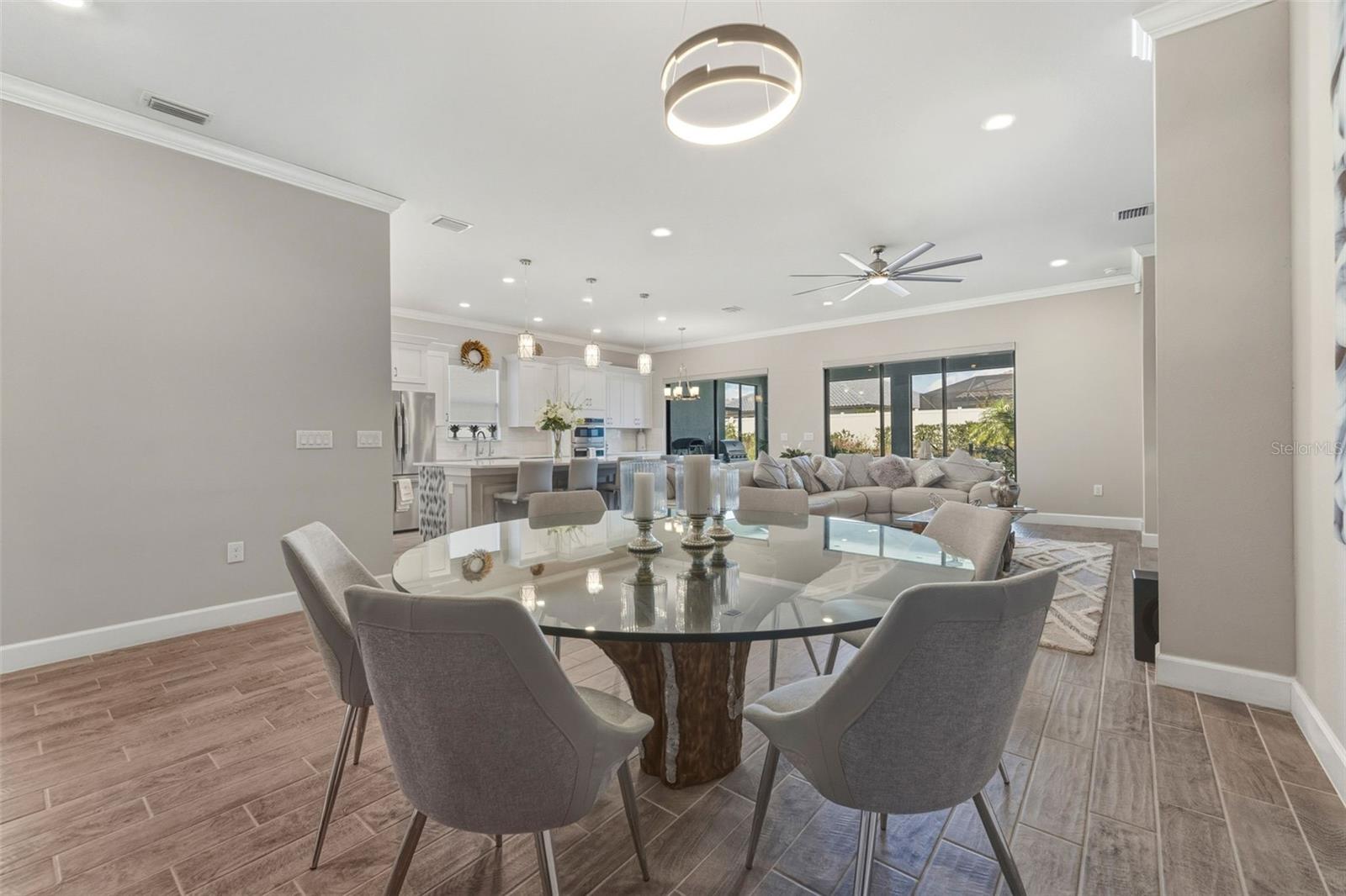 The dining area has room for a table to seat 6-10 easily.