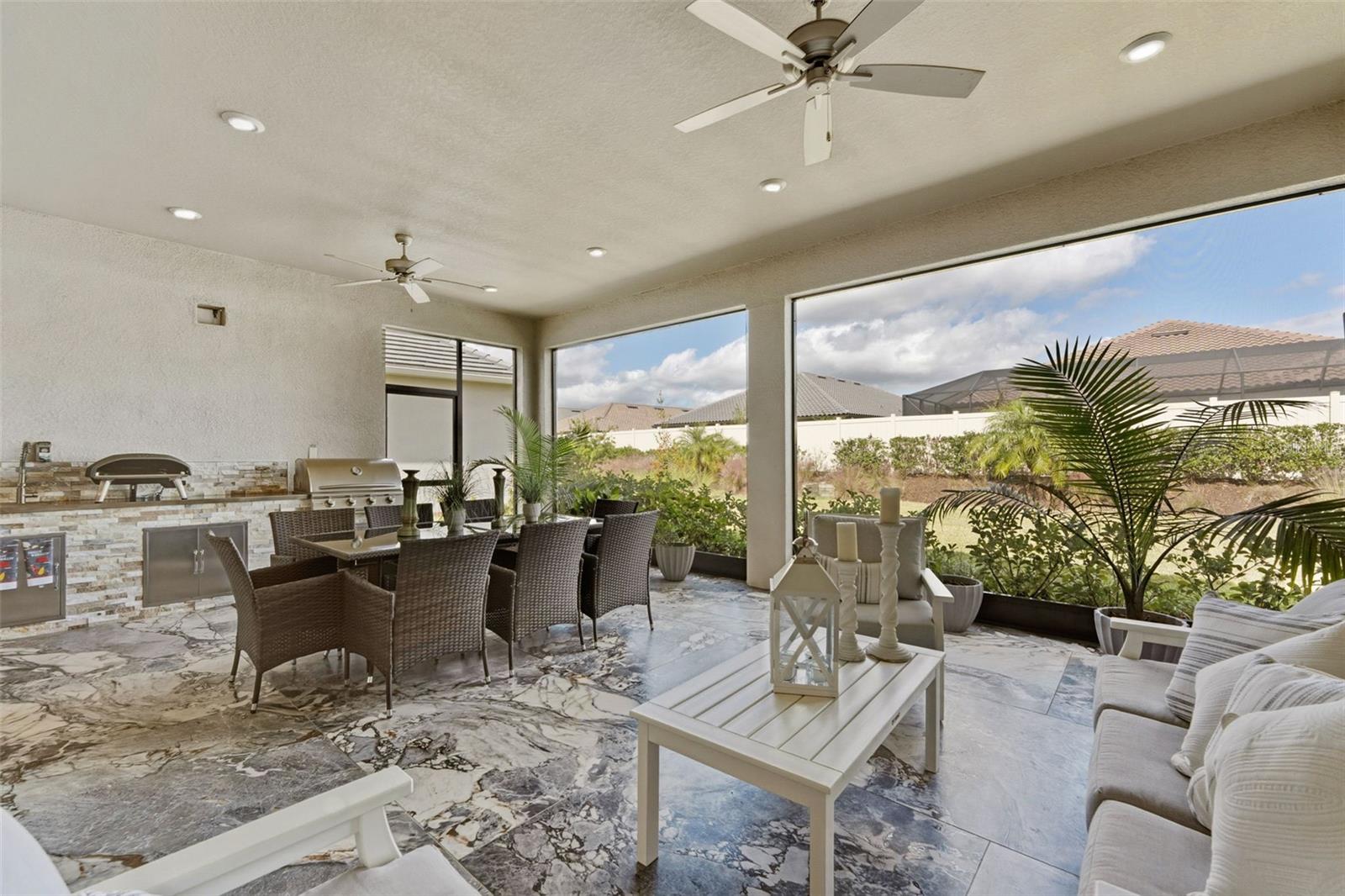 The outdoor kitchen is ready for the chef! And the tiled floor allows for easy clean-up!