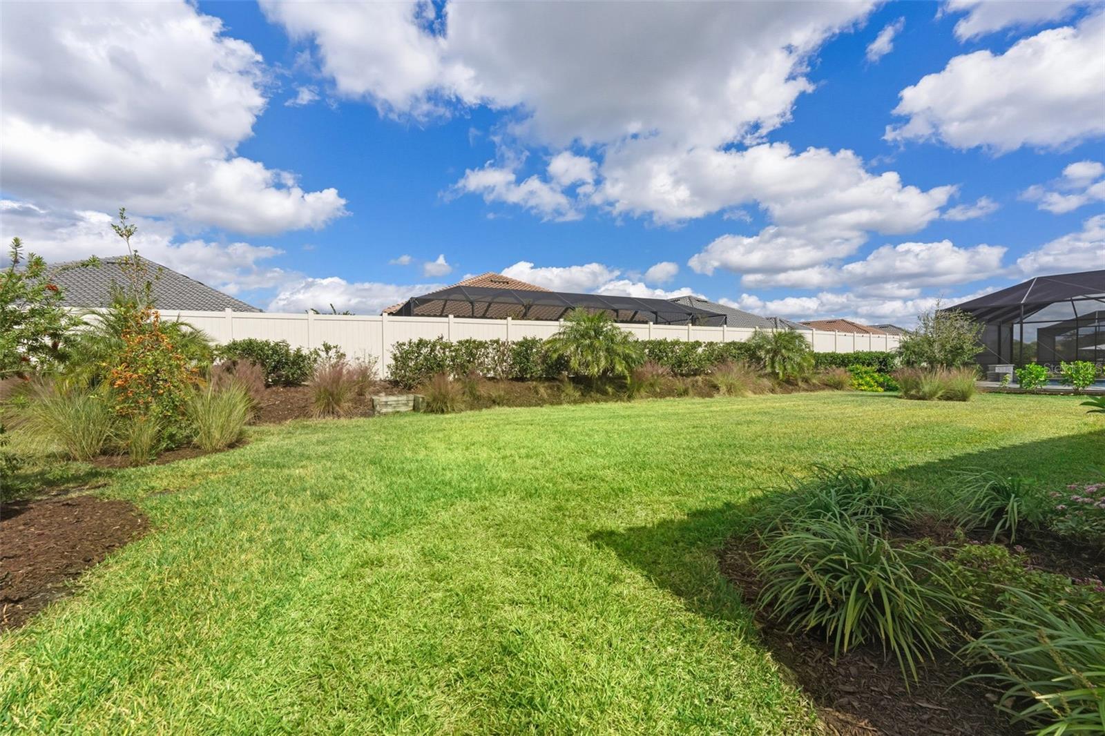 The well landscaped and nicely HOA maintained backyard offers a tranquil and quiet area.