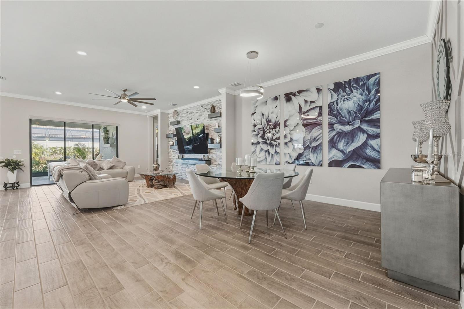 The well positioned dining and living areas offer ample space for gathering family or friends.