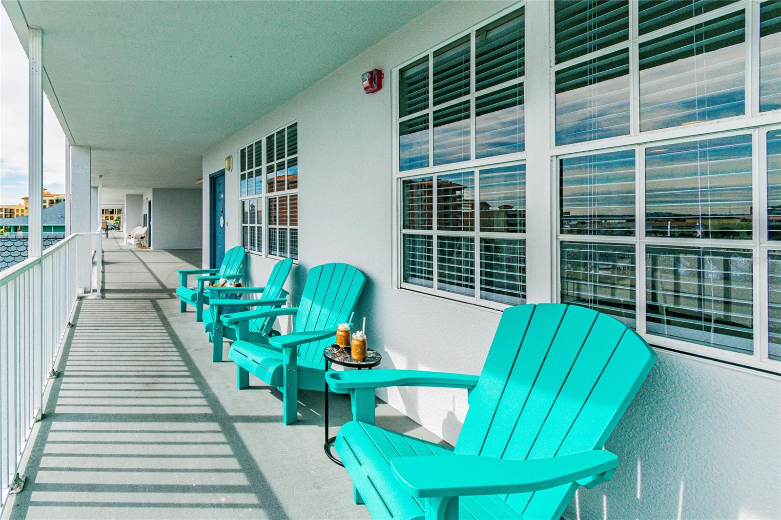 shared covered east facing balcony with access to elevator and all units