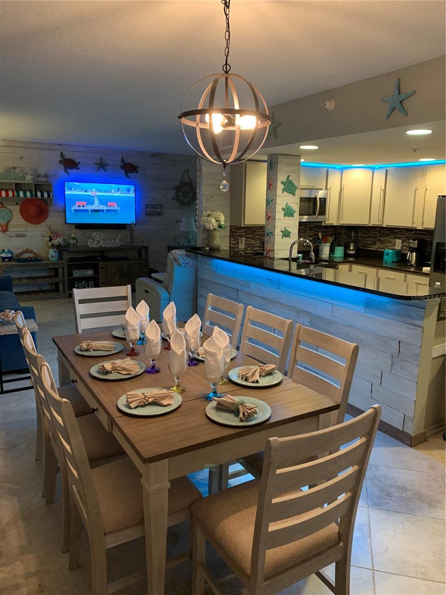 dining / kitchen area with accent lighting