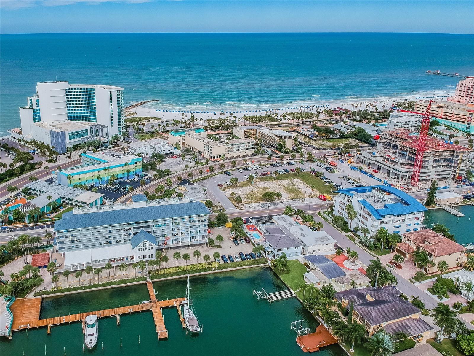 west facing aerial of building and clearwater beach