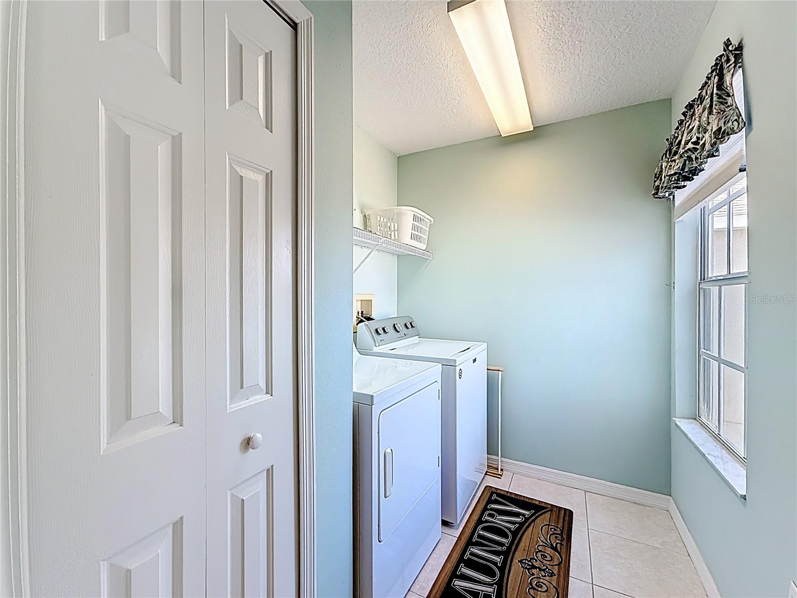spacious laundry room on second floor for convenience