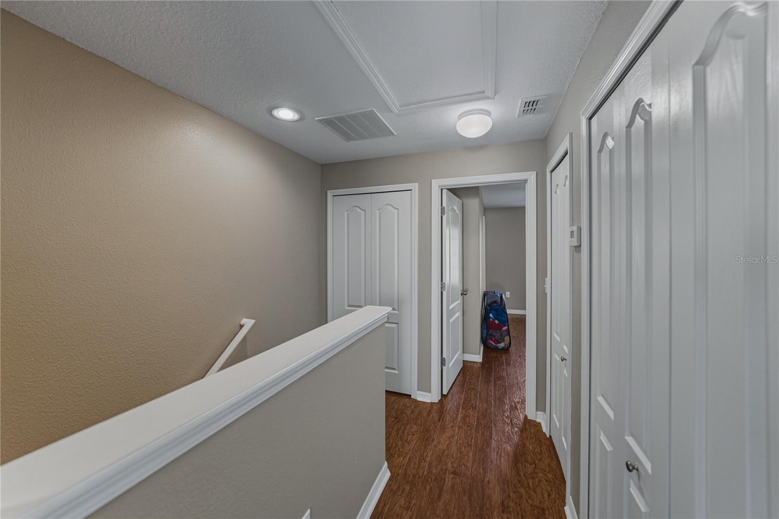 LVP Wood Landing with Laundry Closet