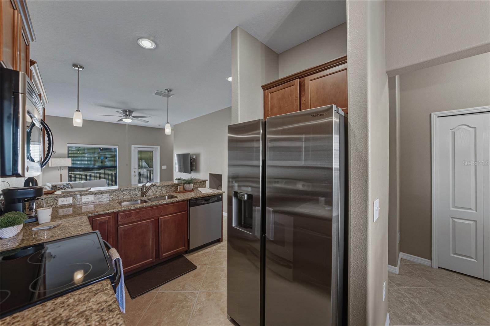 Kitchen with Solid Wood Cabinets and Crown Molding