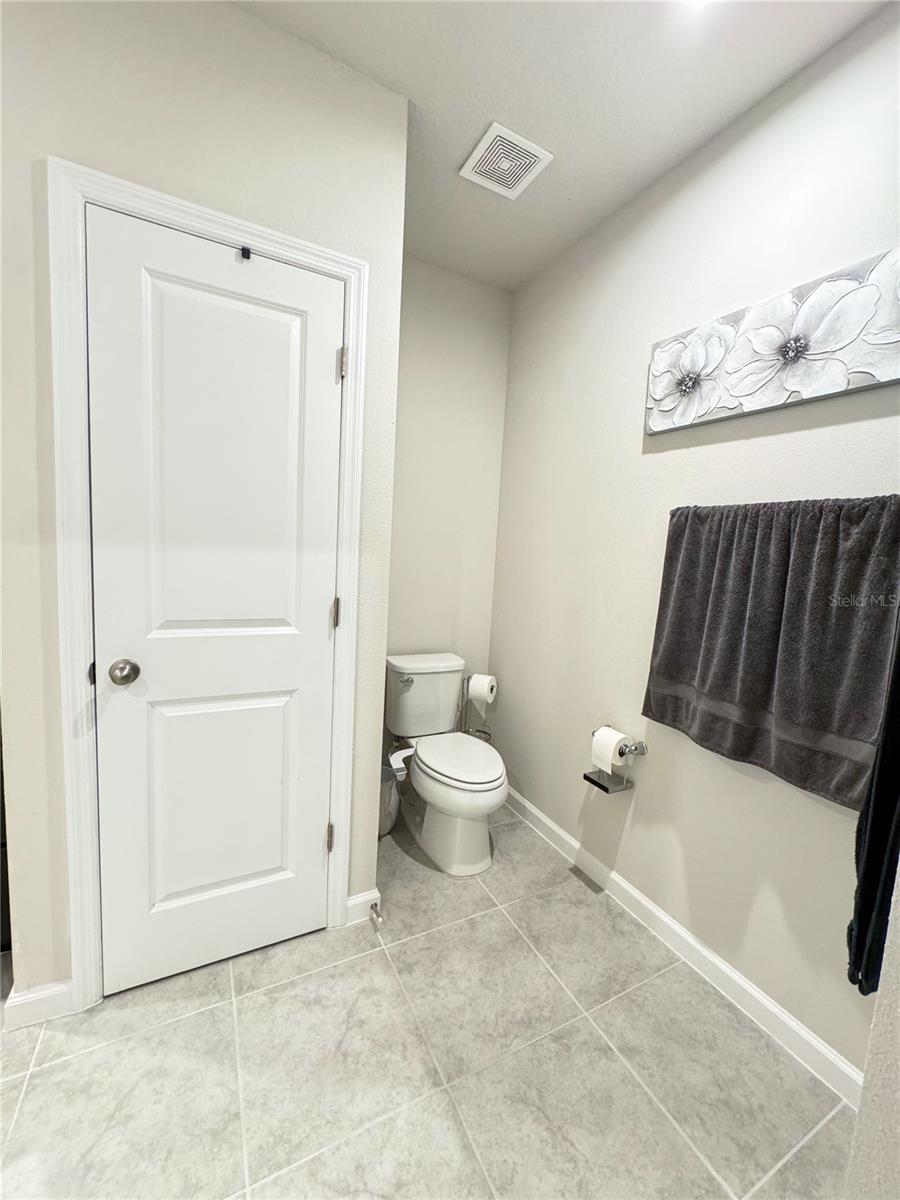 Master Linen Closet and Toilet